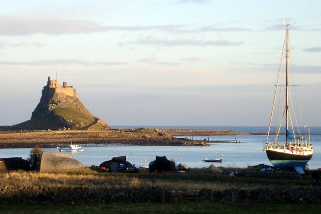 A view across Holy Island Harbour to Lindisfarne Castle in the distance