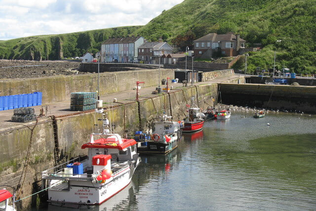 Fishing boats docked at Burnmouth Harbour